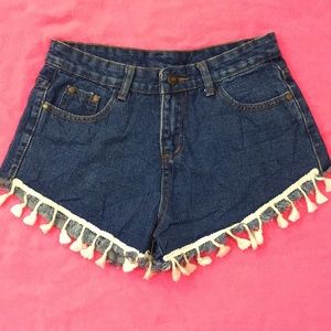 Blue jeans shorts with fringe